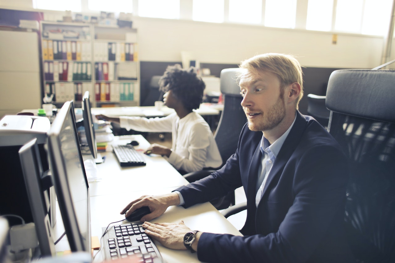 people sitting in front of computers